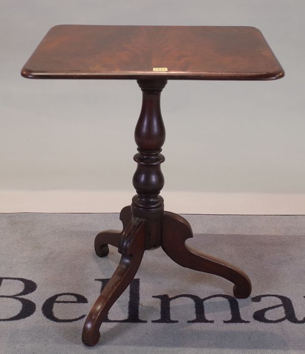 A 19th century mahogany rectangular tripod table, 60cm wide x 74cm high.