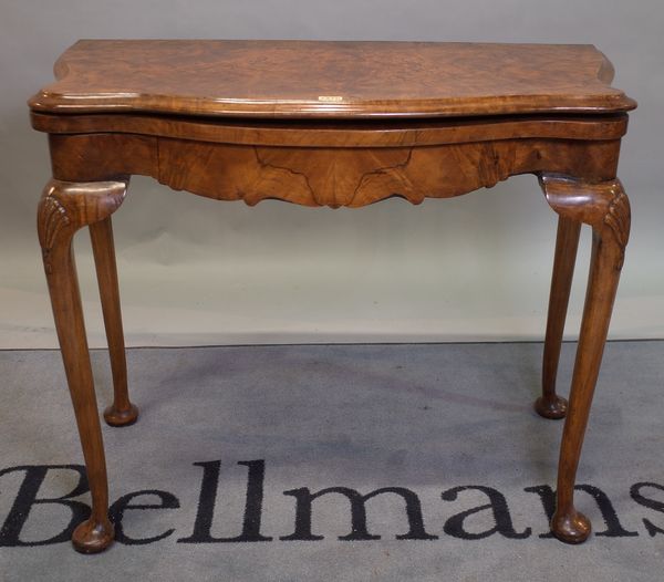 An 18th century style burr walnut demi-lune card table, 94cm wide x 76cm high.