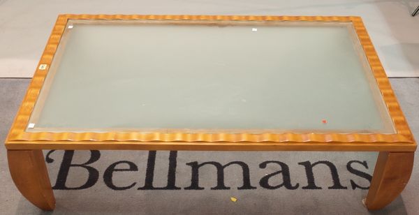 A modern birch rectangular coffee table with inset frosted glass, 128cm wide x 38cm high.