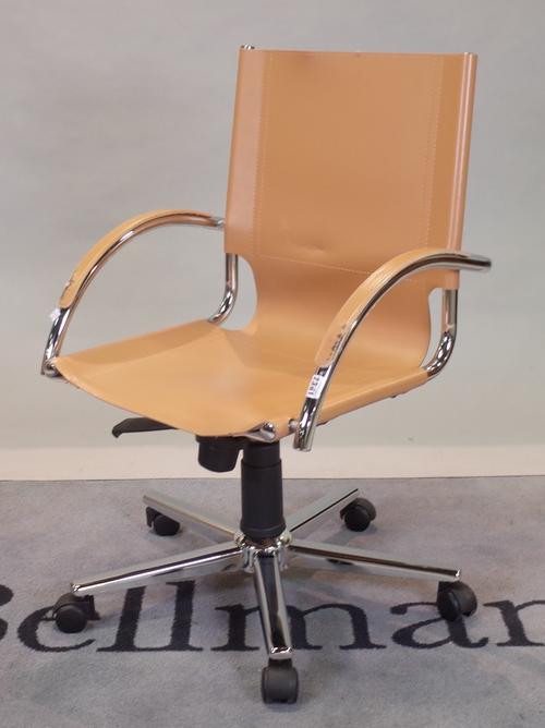 A modern tan leather and chrome office open armchair, 56cm wide x 89cm high.