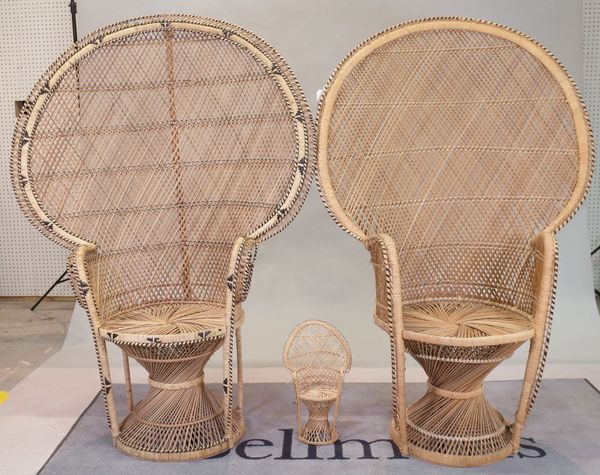A near pair of modern rattan peacock armchairs, 57cm wide x 148cm high, and a miniature example, 18cm wide x 40cm high, (3).