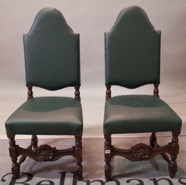 A set of five late 17th century style oak dining chairs with green leather upholstery, 48cm wide x 107cm high, (5).
