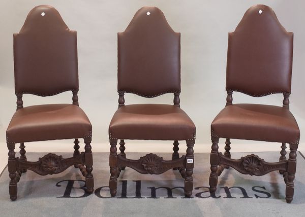 A matched set of eight late 17th century style oak dining chairs, 48cm wide x 107cm high, (8).