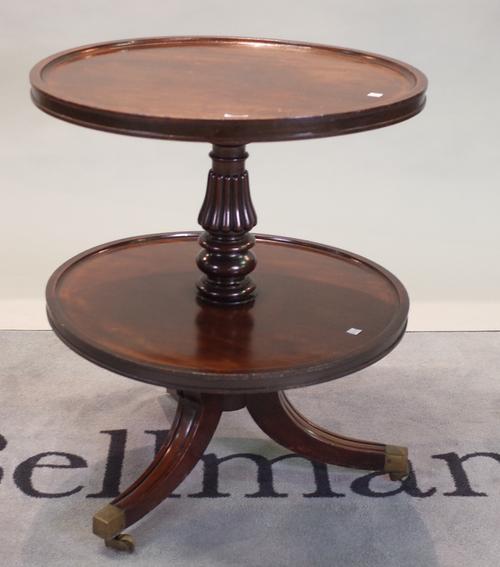 A Regency and later mahogany circular two tier dumb waiter, 61cm diameter x 72cm high.