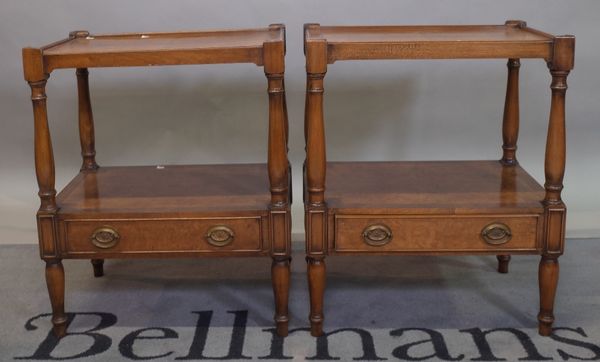A pair George III style walnut two tier bedside tables, 55cm wide x 66cm high, (2).
