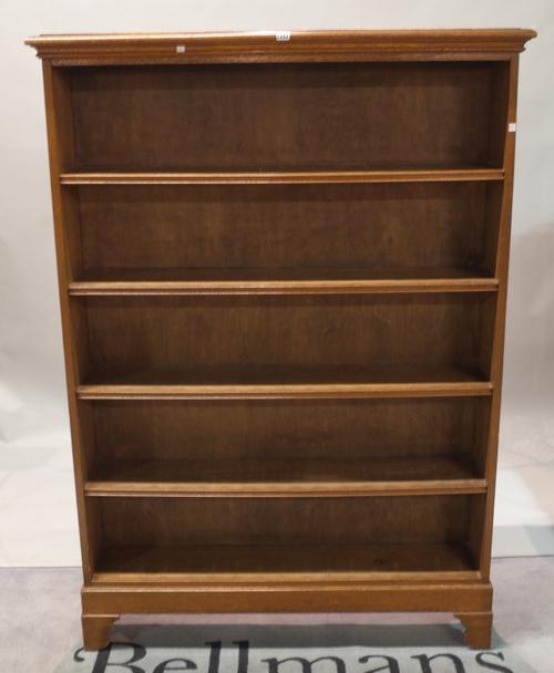 A modern oak open five tier bookcase, 125cm wide x 180cm high.