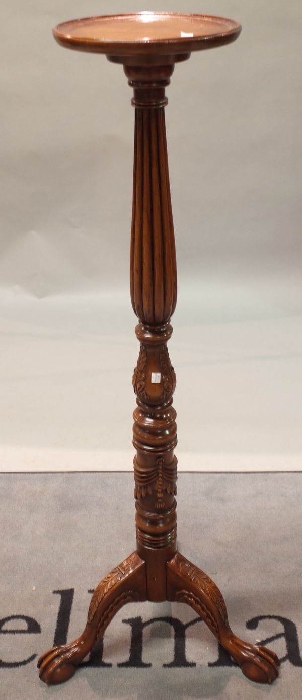 A modern mahogany tripod jardiniere stand, 29cm wide x 132cm high.