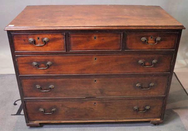 A George III mahogany boxwood strung chest, fitted with three short and three long drawers, 110cm wide x 85cm high.