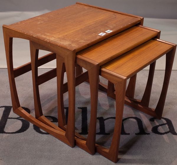 G PLAN;  a nest of three teak occasional tables, the largest 54cm wide x 49cm high.