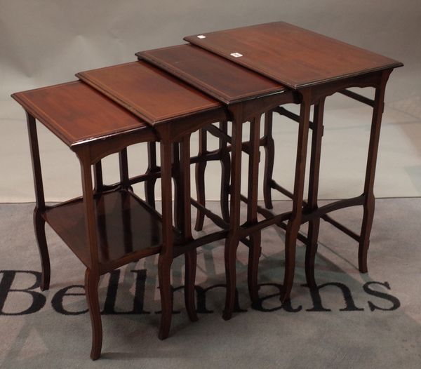 An Edwardian mahogany nest of four tables, the largest 55cm wide x 68cm high, (4).