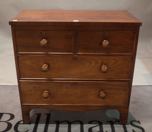 A George III mahogany chest, fitted with two short and two long drawers, on shaped apron stand, 96cm wide x 86cm high.