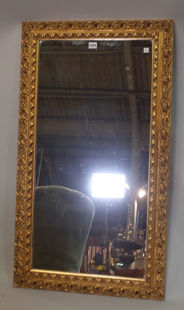 A modern gilt framed rectangular wall mirror, 108cm wide x 49cm high.