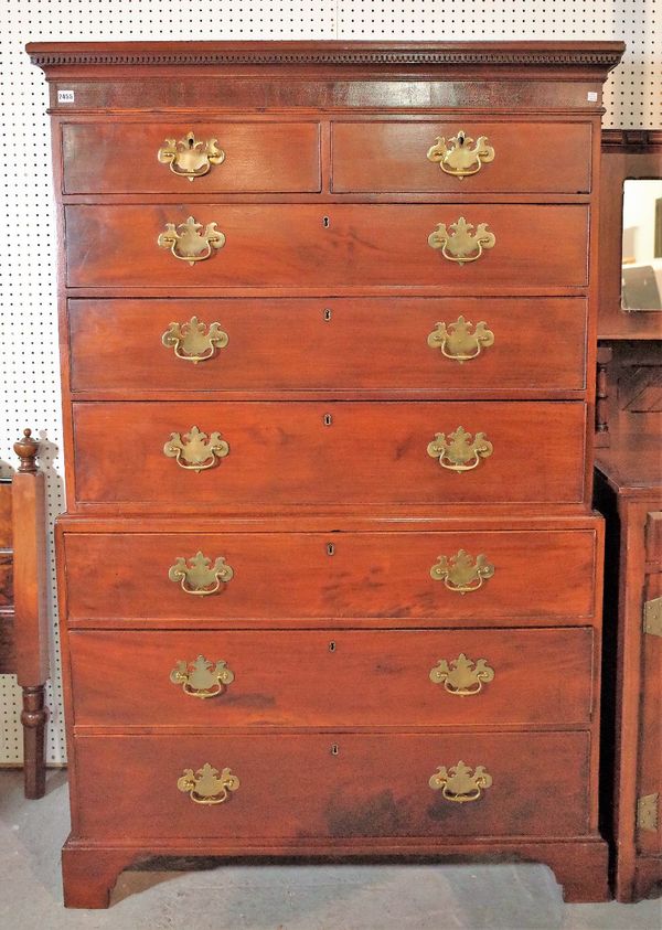 A George III mahogany chest on chest with two short over six long graduated drawers on bracket feet, 116cm wide x 183cm high.