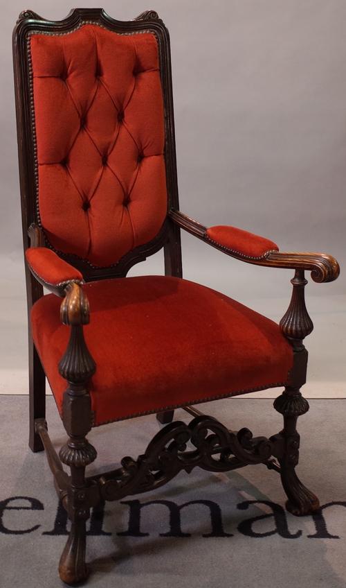 An early 18th century style oak open armchair, with buttonback upholstery, 64cm wide x 117cm high.