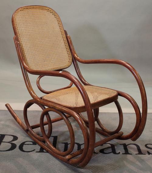 LIGNA made in Czechoslovakia ; a late 19th century bentwood rocking open armchair, 51cm wide x 98cm high.