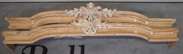 A pair of early 20th century pine pelmets, each 137cm wide (a.f) (2).