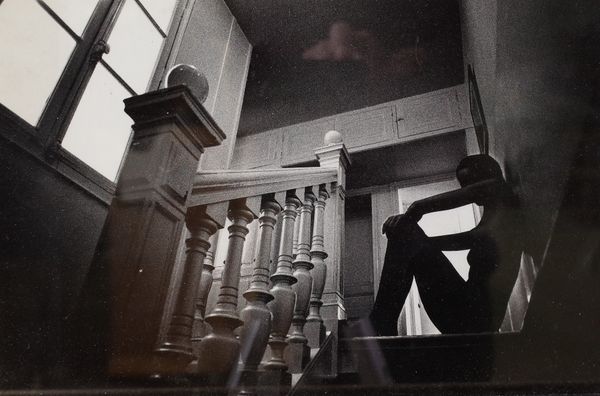 Jeanloup Sieff (French 1933-2000), Femme dans l'escalier, photographic print, 19.5 x 29.5cm ARR