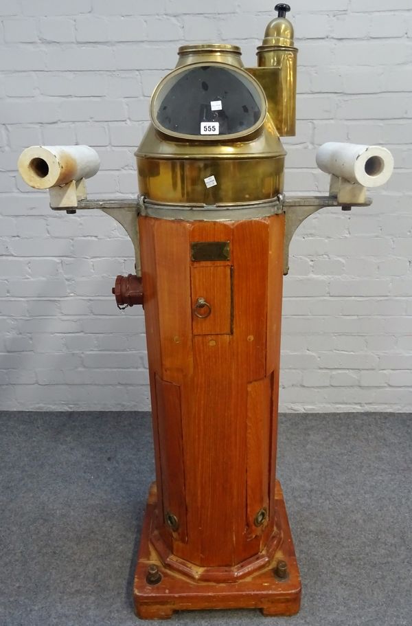 A C.A.I.M GENOVA 5913 ship's binnacle, circa 1940, with brass hood over a gimble, mounted compass and oak stand, 131cm high overall.