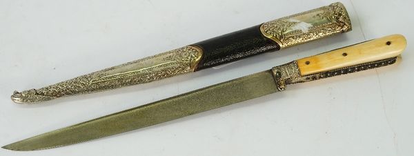 A Turkish dagger Bichaq, mid-19th century, with watered steel blade and wooden lined leather scabbard, length 38cm.