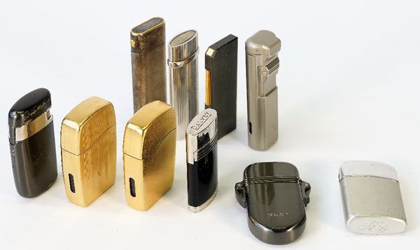 A collection of ten various lighters, including YSL, Ronson and Charles Jourdan, (10).