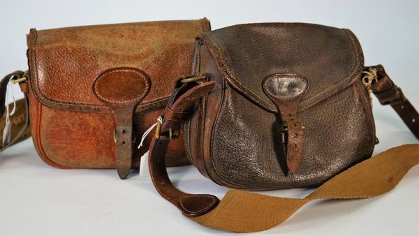 Brady; a pigskin 75 shell cartridge bag, together with an A.W. Gamage Ltd 75 shell hogskin cartridge bag, (2).