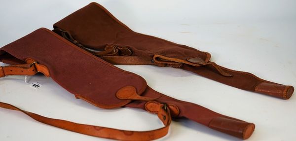 Brady, Halesowen, two leather and canvas gun slips, 127cm and 121cm long, (2).