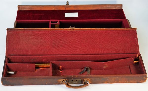 A leather shotgun travelling case, the cover embossed 'Kennedy, Alderley, Edge' 76cm wide, together with another similar, 81cm wide, (2).