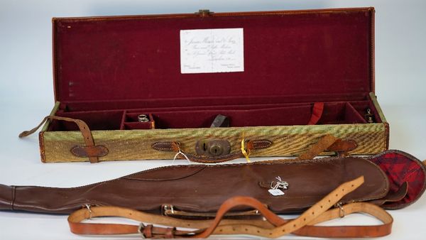 A leather bound canvas shotgun travelling case, 77cm wide, a leg of mutton canvas case, 82cm wide and a leather leg of mutton gun slip, 82cm wide,...