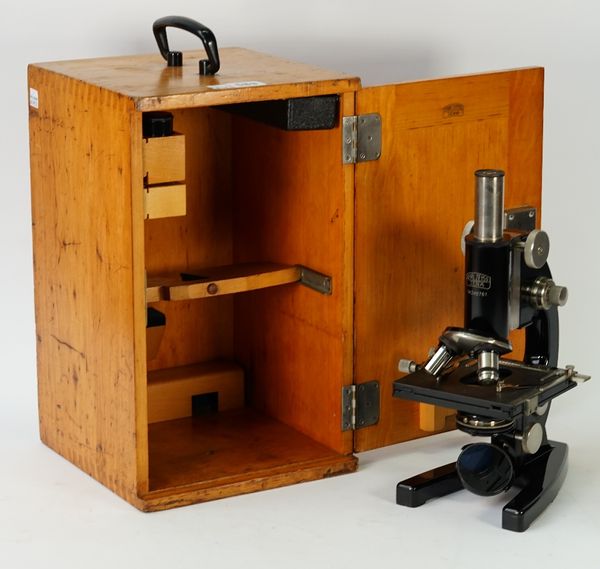 A Carl Zeiss Jena microscope, the fitted case with additional eyepieces, height of microscope fully extended 37cm.