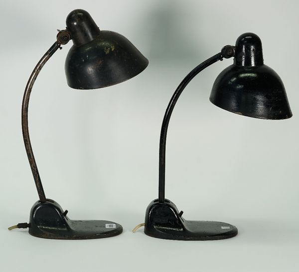 Two Bauhaus design Siemens TL3650 black painted metal desk lamps, circa 1930, with adjustable stems and shades, 48cm high, (2).