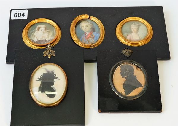 Three 18th/19th century portrait miniatures on ivory, framed as one, depicting Mary, Queen of Scots, King Louis XV of France and Princess Helene de...