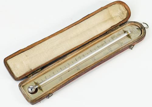 A leather cased thermometer by S. Holdsworth, New Wells, Wakefield, early 19th Century, the silvered scale 20cm high.