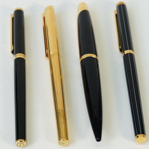 Three various Dunhill fountain pens, one having a pin stripe design, and a Dunhill torpedo shaped pen (lacking cartridge), (4).