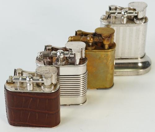 Four various Dunhill lighters, to include a leather bound petrol lighter and a brass cased gas lighter, (4).