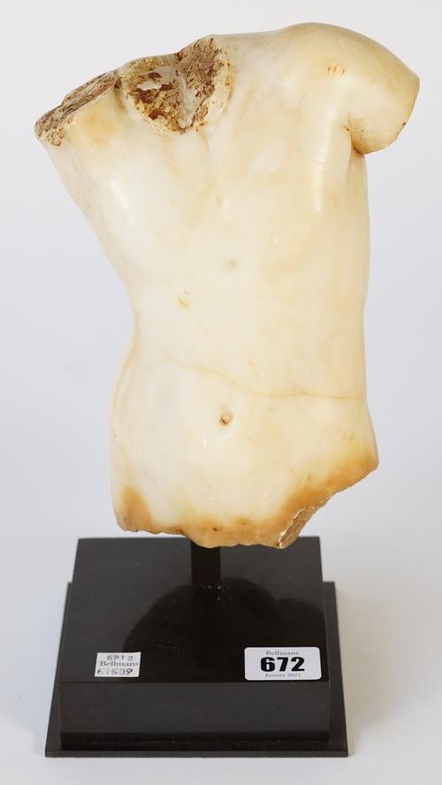 After the antique, a faux marble torso, 22cm high, mounted on a stand.