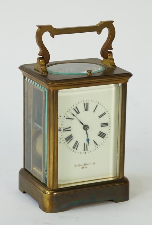 Sir John Bennett Ltd, Paris, a brass cased carriage clock, late 19th century, with push repeat and striking on a gong, the cream dial with Roman...