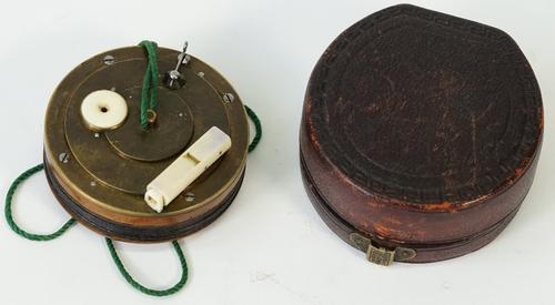 A mid-19th century mahogany cased brass and ivory mounted bird caller, possibly German, the hand cranked bellows imitating the chirping of a bird,...