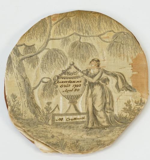 A George III oval silk work panel, signed M:Cruttwell, two 19th century alphabet samplers and two further samplers, unframed, (5).