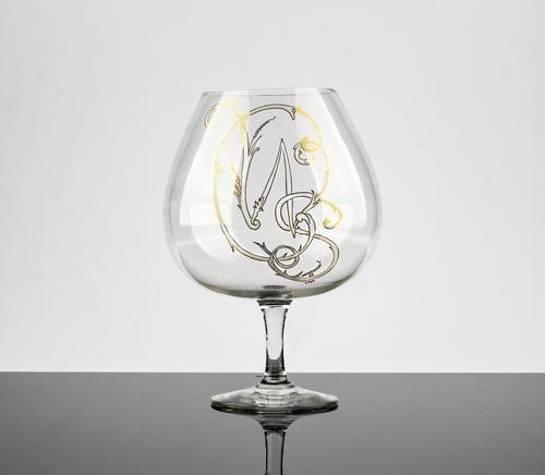 Sir Winston Churchill's brandy balloon, circa 1960, with large tulip shaped bowl decorated in white enamel with monogram WSC, outlined in gilding,...