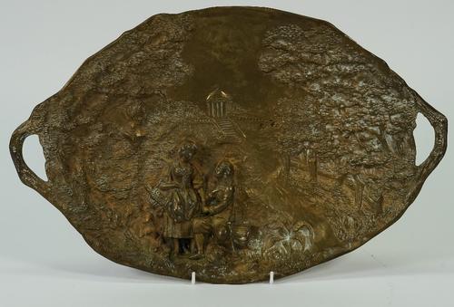 An early 20th century gilt bronze twin-handled tray, cast in relief with figures in a landscape, inscribed A. VAN KOTE, 4.5cm high x 43cm wide.