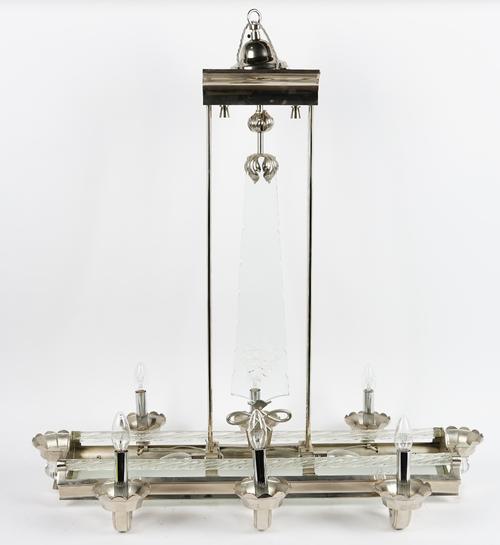 An Art Deco style glass and chrome six light pendant light fitting, with star cut glass panel, the inset curved frosted glass star cut base issuing...