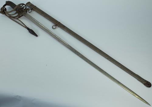 An Indian Police Senior Ranks Sword, circa 1901-1946, the etched blade measuring 83.5cm and the hilt with India Imperial Police cypher, with a two...