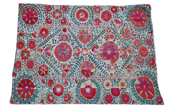 A Bokhara Susani panel, central panel and surround with large and small madder rosette leaf sprays, printed floral backing, 214cm x 160cm.