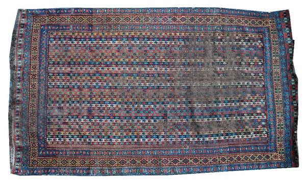 A Cane Shiraz rug, south Persian, the field with vertical polychrome bands bearing minor botehs, a saffron diamond border, dice ends, 223cm x 133cm.