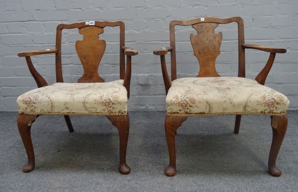 A pair of mid-20th century child's walnut open armchairs, of George I design, 57cm wide x 66cm high, (2).