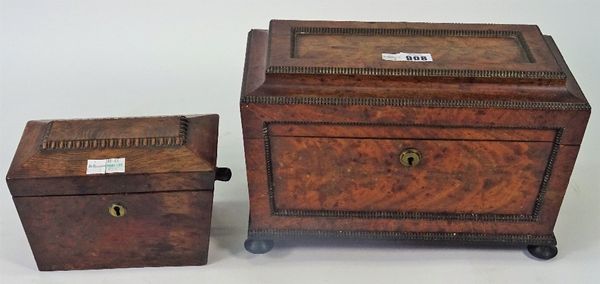 A William IV mahogany sarcophagus tea caddy, with twin lidded interior and split bobbin mounts, 33cm wide x 20cm high, together with a similar...