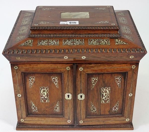 A Regency mother-of-pearl inlaid rosewood jewellery/writing box, the lift top and pair of doors enclosing an extensive fitted interior, 36cm wide x...