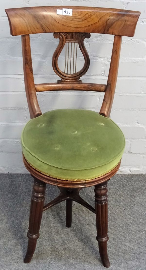 A Regency rosewood lyre back height adjustable music stool on splayed reeded supports, 43cm wide x 84cm.