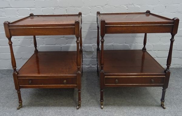 A pair of mahogany square two tier occasional tables with single drawer bases on turned supports, 46cm wide x 64cm high, (2).