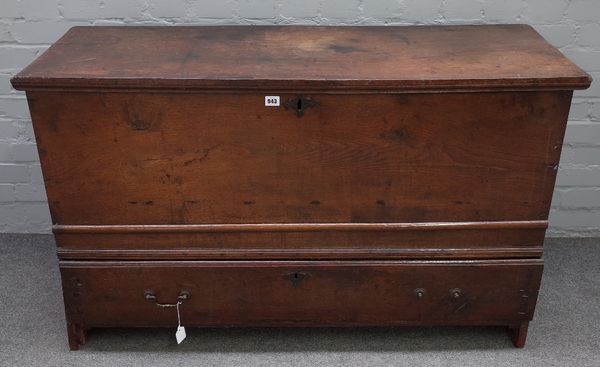 An 18th century oak mule chest, with moulded hinged top over one long drawer, 127cm wide x 77cm high.